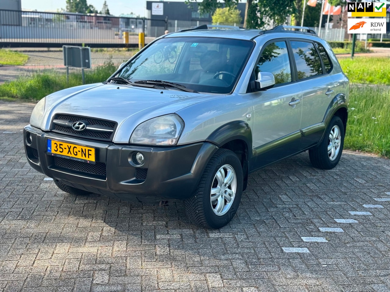Hyundai Tucson - 2.0i Style/Leder/Climatronic - AutoWereld.nl