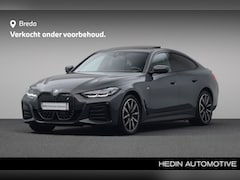 BMW i4 - eDrive40 High Executive 84 kWh | M-sport Pro. | M-remsportschijven | Achteruitrijcamera |