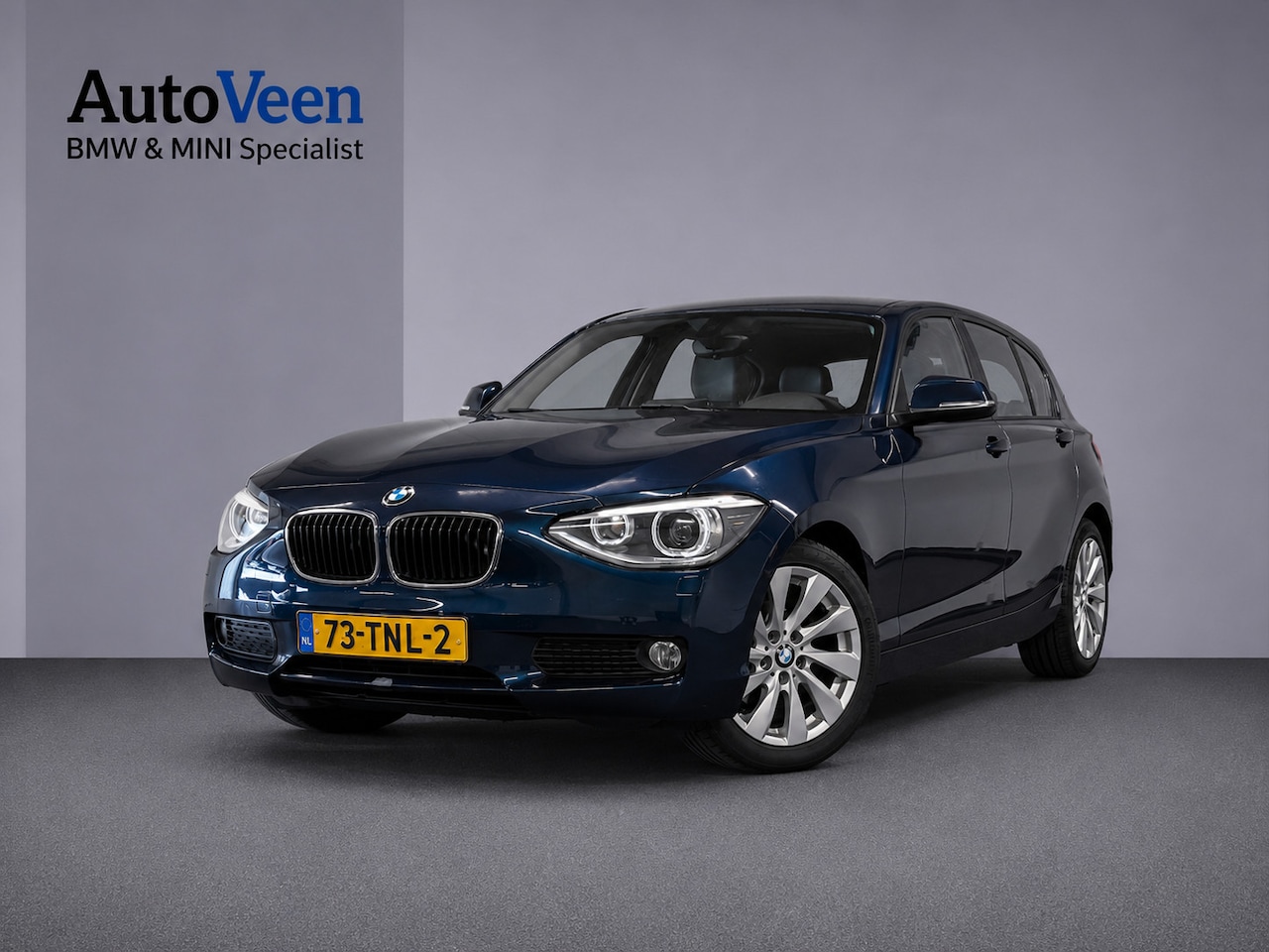 BMW 1-serie - 116i Business+ (PANO, LEER, LED, CRUISE, H&K AUDIO, PARKEERSENSOREN) - AutoWereld.nl