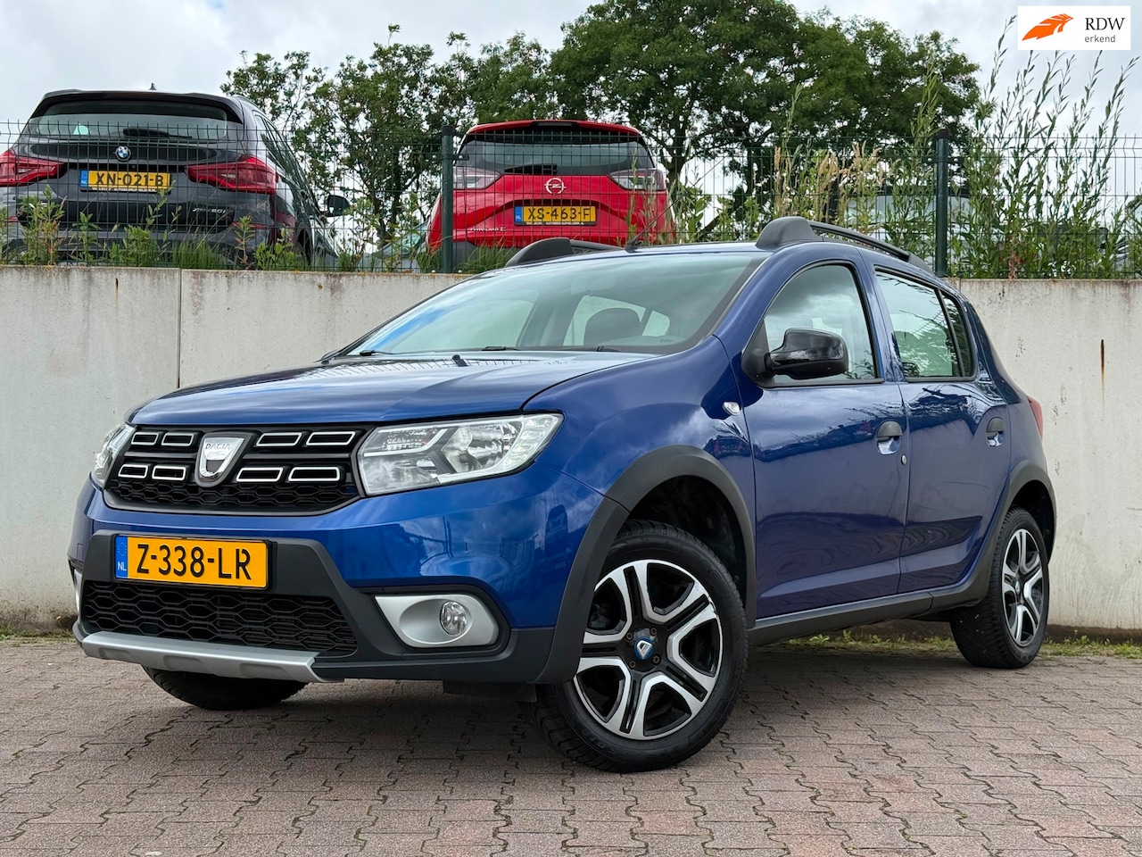 Dacia Sandero - 0.9 TCe Tech Road/NAVI/CRUISE/PDC/NETTE AUTO/CLIMA/57714 KM/ - AutoWereld.nl