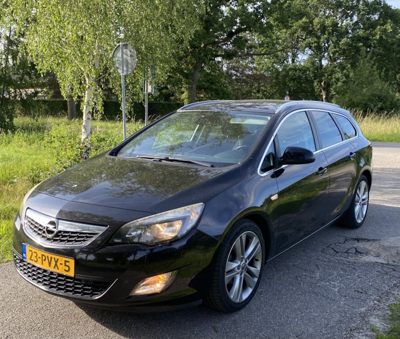 Opel Astra Sports Tourer - 1.4 Turbo Sport 1.4 Turbo Sport - AutoWereld.nl