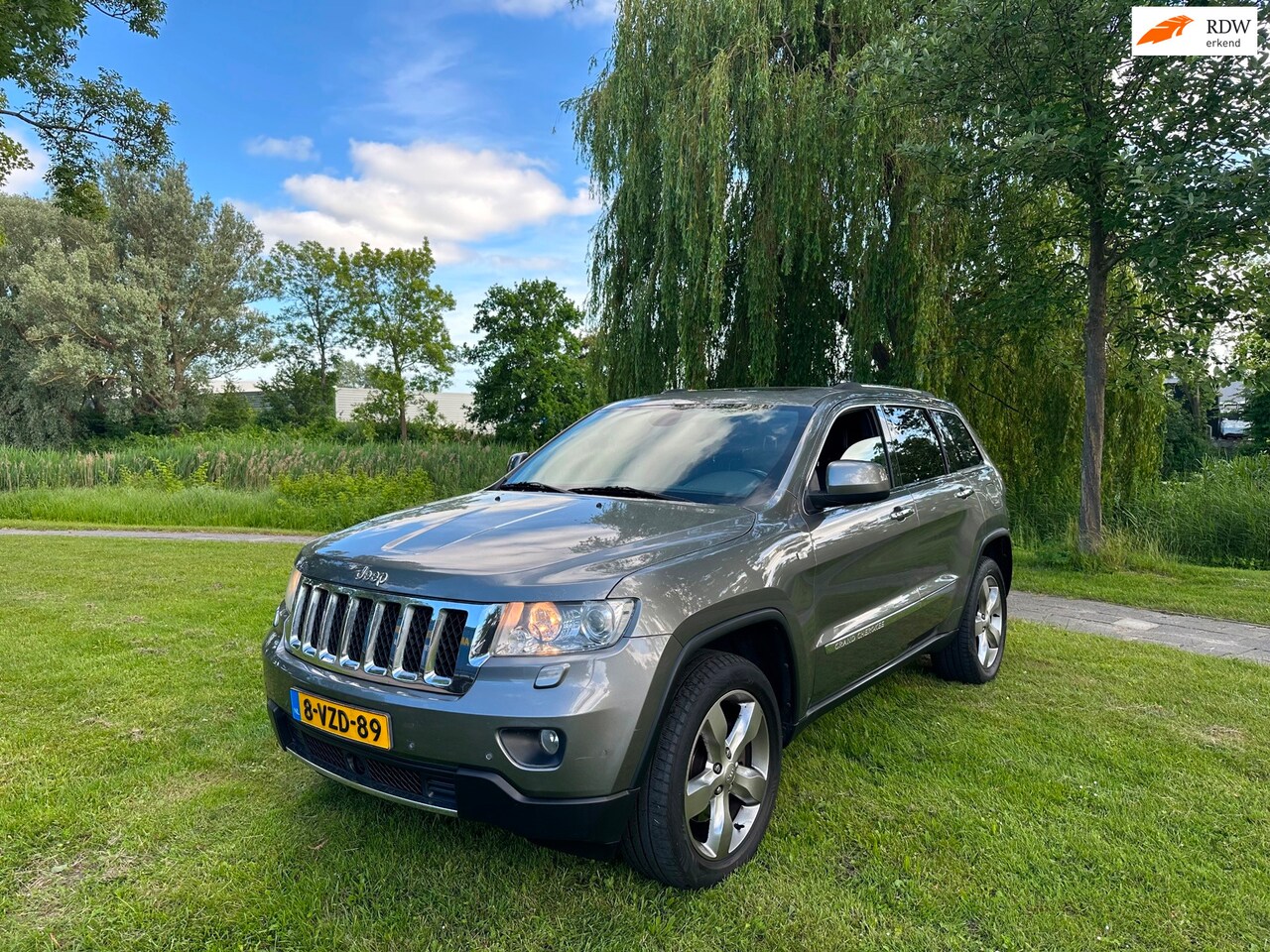 Jeep Grand Cherokee - 3.0 CRD Overland Airco Pano XENON 4X4 LEES TEKST - AutoWereld.nl