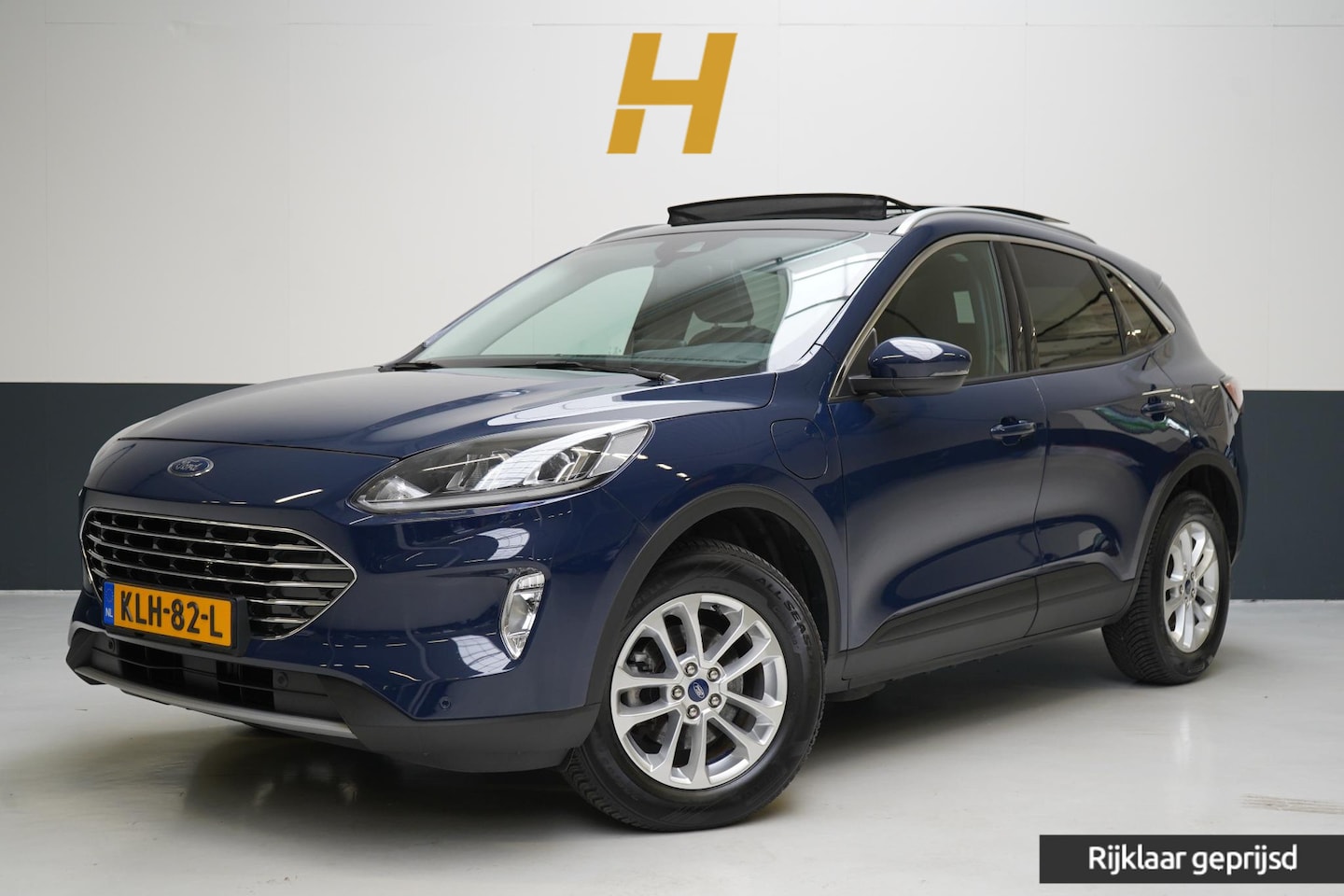 Ford Kuga - 2.5 PHEV Titanium | SoH 96% | Panoramadak | Carplay | Stoelverwarming | Keyless | Lm velge - AutoWereld.nl