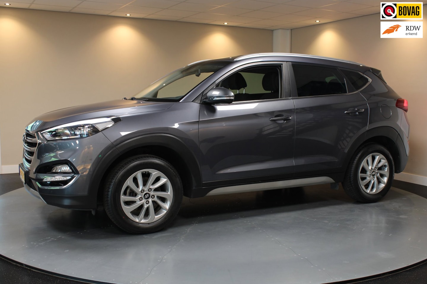 Hyundai Tucson - 1.6 GDi Comfort *Trekhaak* Stoelverw. V+A|Navi|Camera|Cruise - AutoWereld.nl