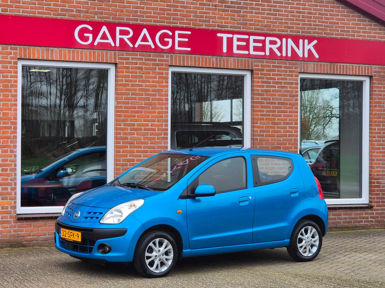 Nissan Pixo - 1.0 Acenta 68PK 5drs airco, elektr.ramen, stuurbekr. radio/cd, lmv - AutoWereld.nl