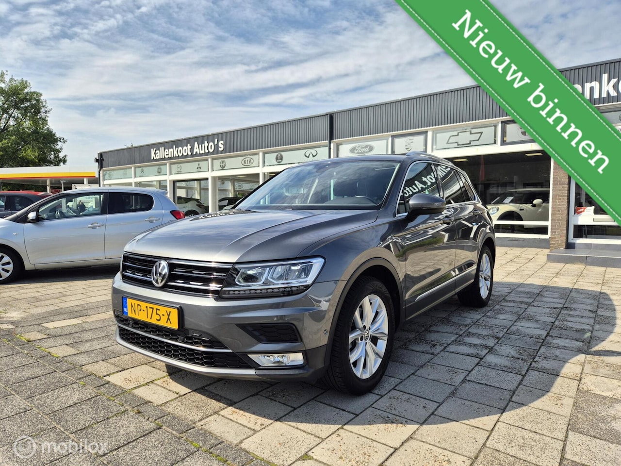 Volkswagen Tiguan - 1.4 TSI Highline 1.4 TSI Highline, Pano, Trekhaak, Massage - AutoWereld.nl