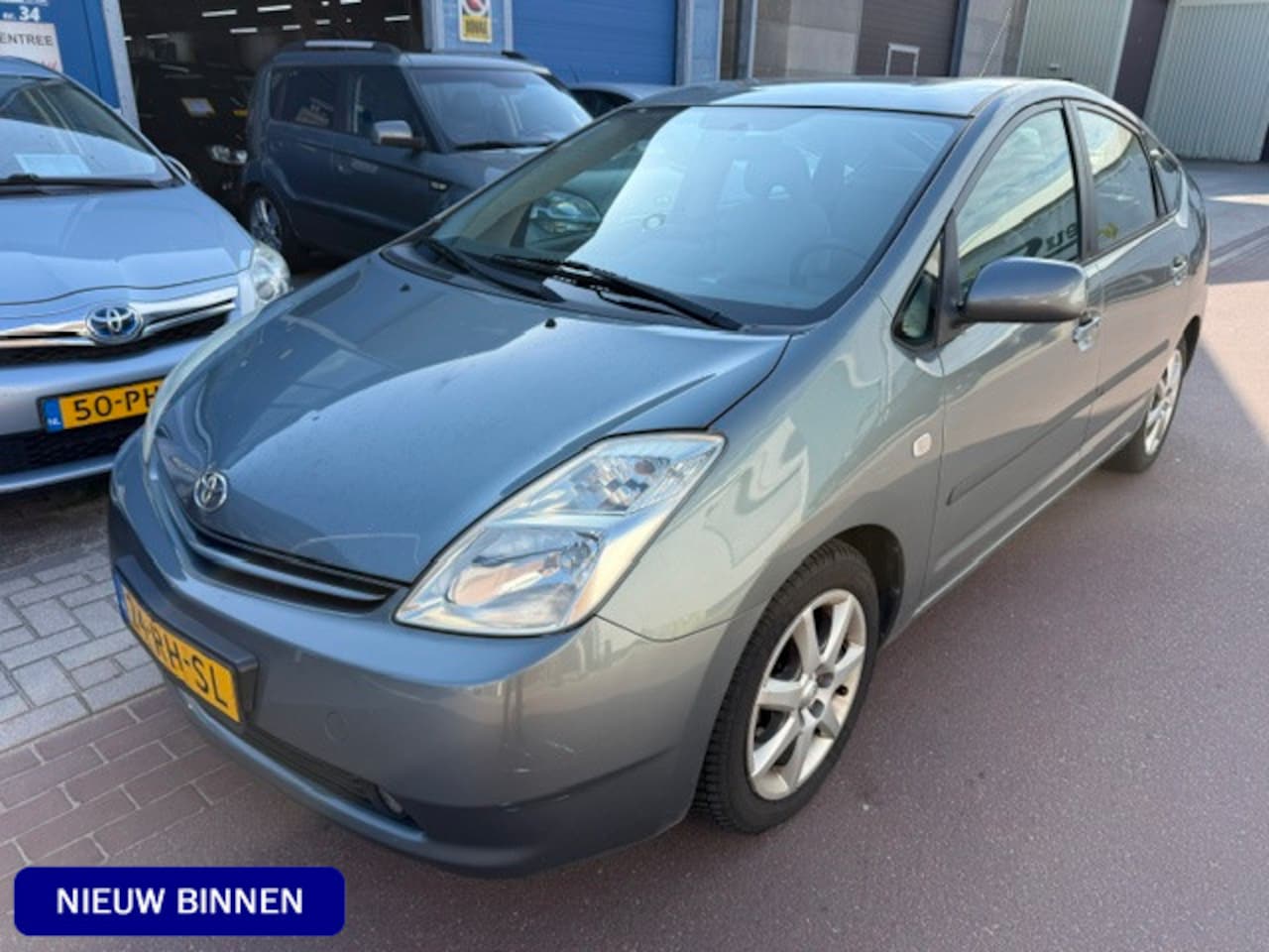 Toyota Prius - 1.5 VVT-i Business 2005 1e eigenaar NAP 196.323km Navigatie, koude airco, PDC achter, etc. - AutoWereld.nl