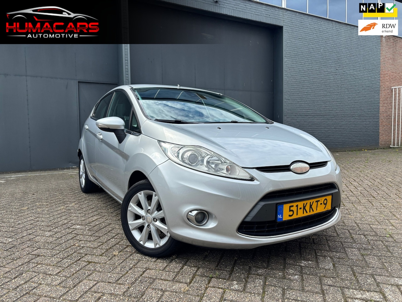 Ford Fiesta - 1.25 Ghia|Nap|Airco|Cruise - AutoWereld.nl