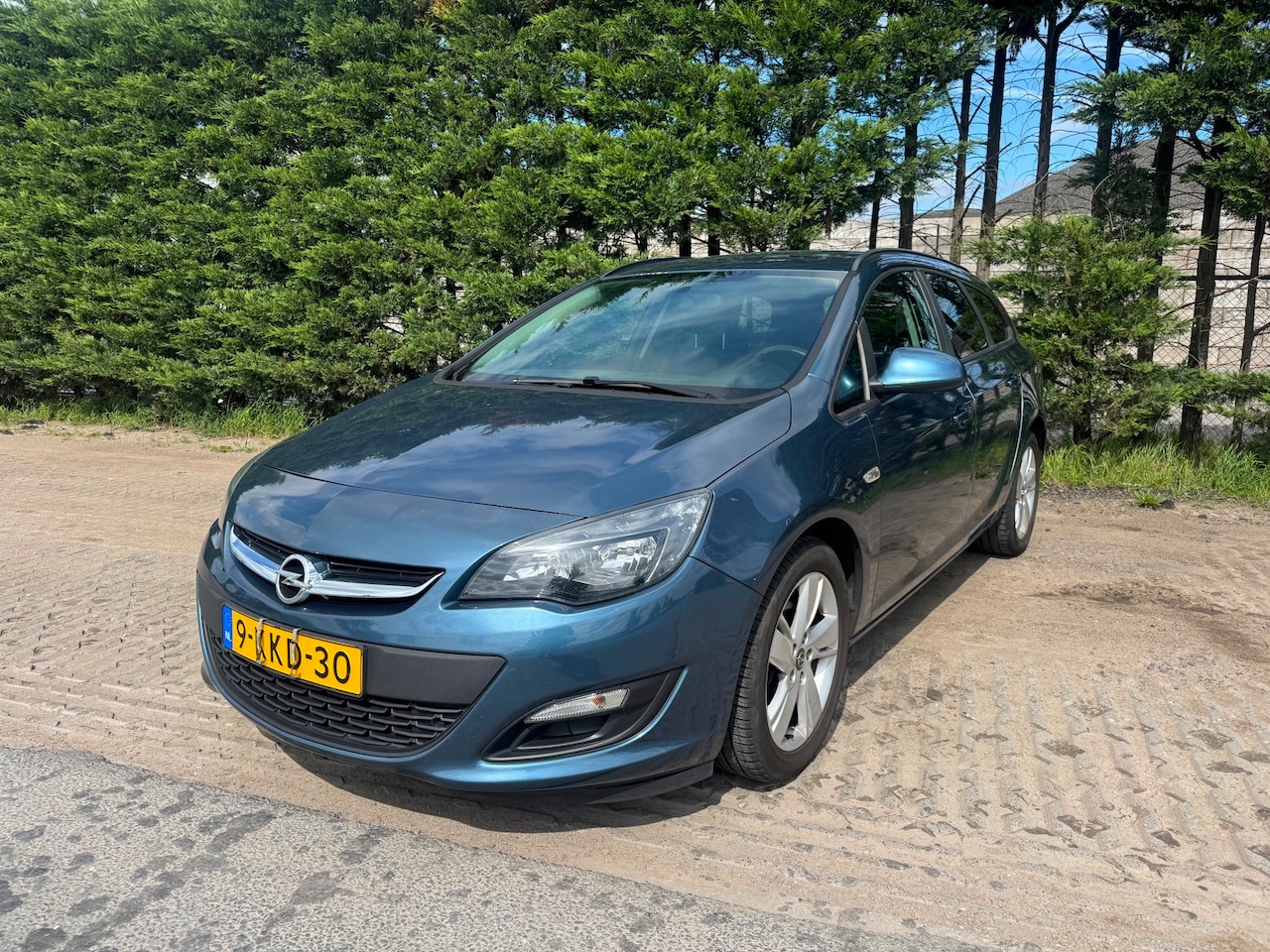 Opel Astra Sports Tourer - 1.7 CDTi Business + - AutoWereld.nl
