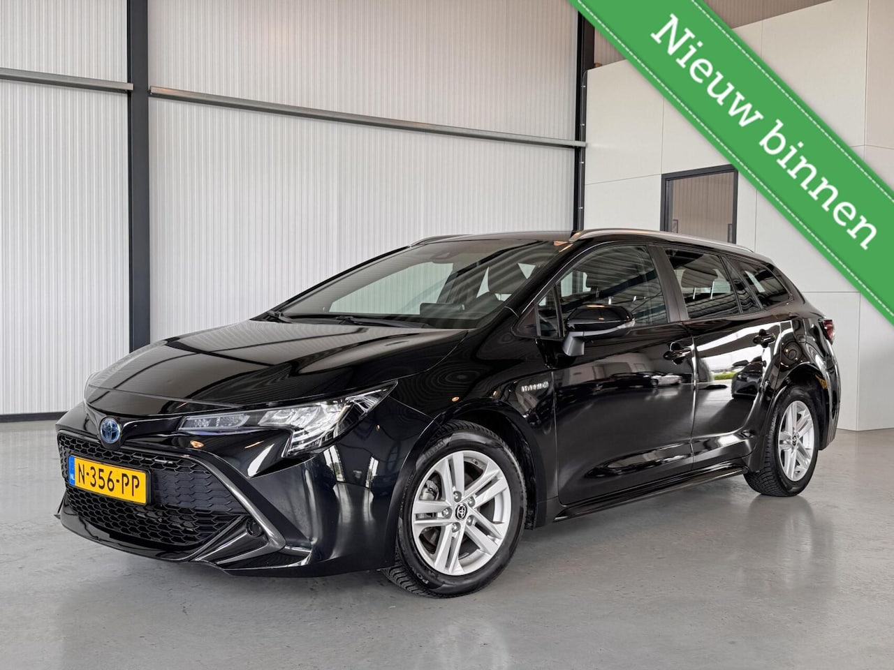 Toyota Corolla Touring Sports - 1.8 Hybrid Active|Camera|Navi|Apple&Android CarPlay| - AutoWereld.nl