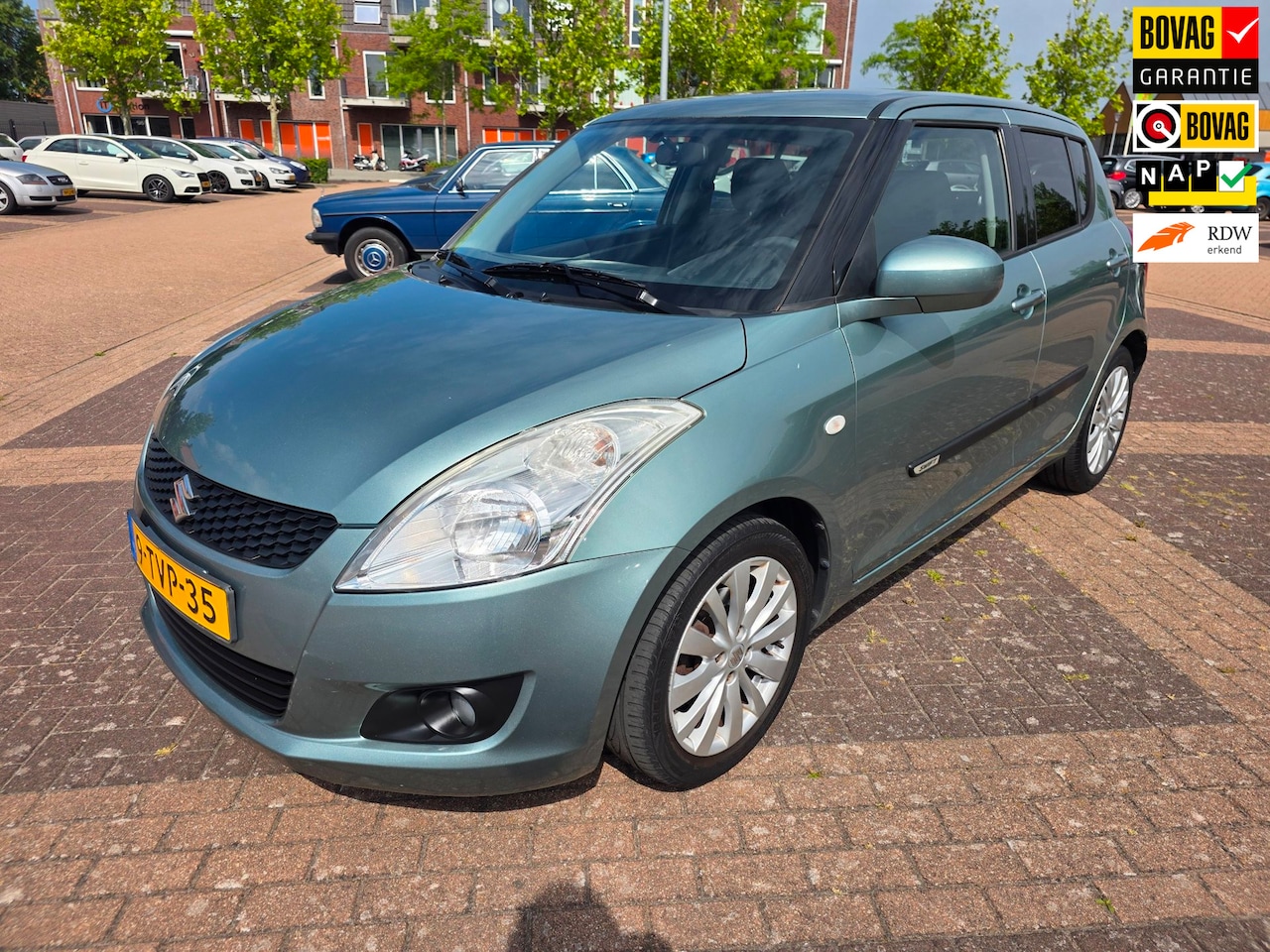 Suzuki Swift - 1.2 Exclusive EASSS |STOEL VERWARMING|CRUISE| AIRCO| - AutoWereld.nl