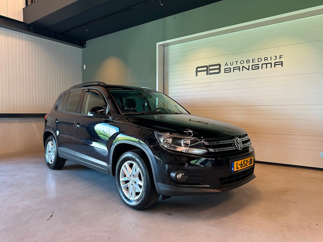 Volkswagen Tiguan - 1.4 TSI SPORT&STYLE-uitv|CLIMA AIRCO|CRUISE CONTROL|LM-VELG|STOELVERWARMING|TREKHAAK|APK+O - AutoWereld.nl