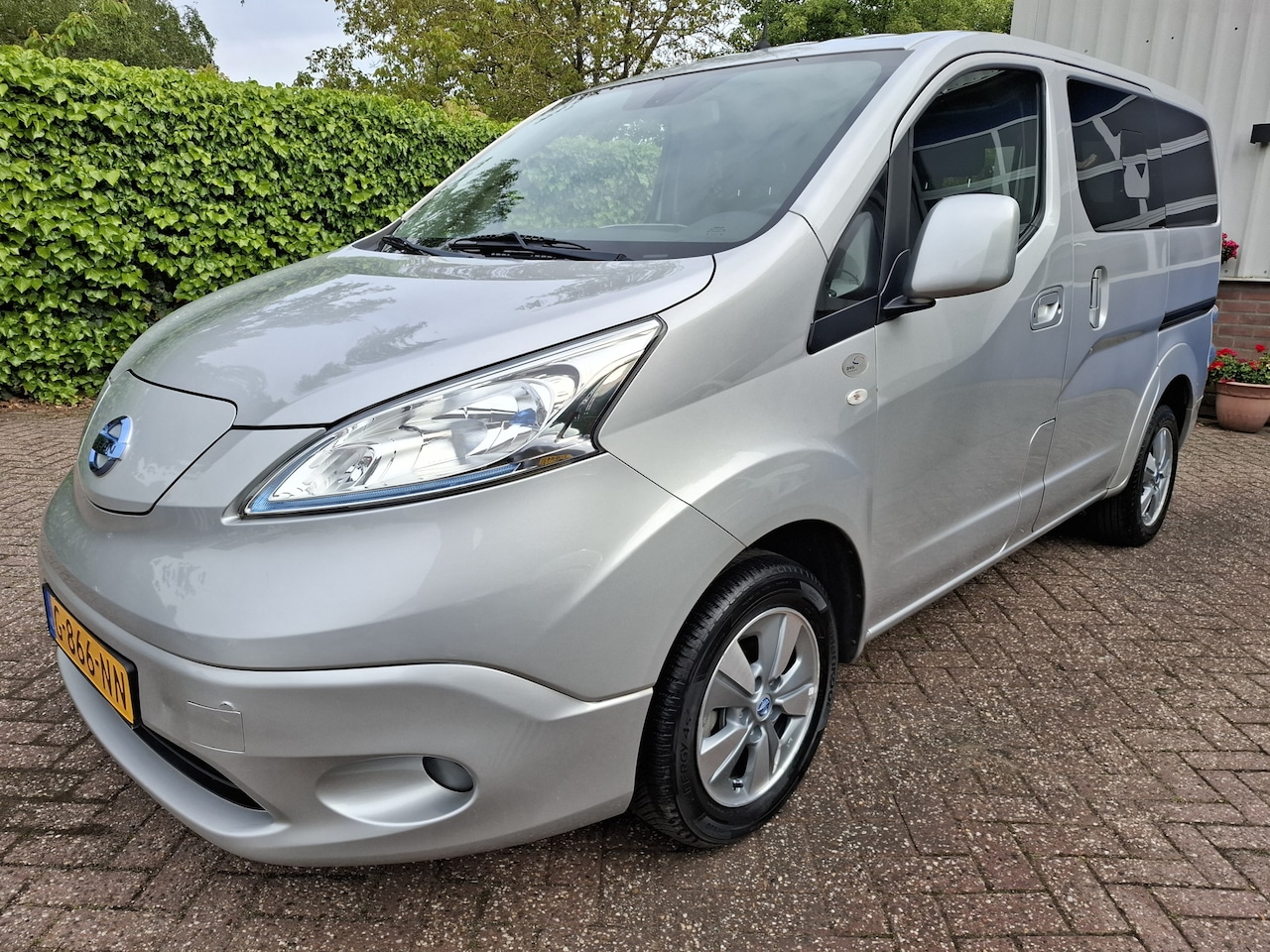 Nissan e-NV200 Evalia - 40KWH 12350.- EX BTW SOH 86.5% 7-PERS ROLSTOELVERVOER 110PK - AutoWereld.nl