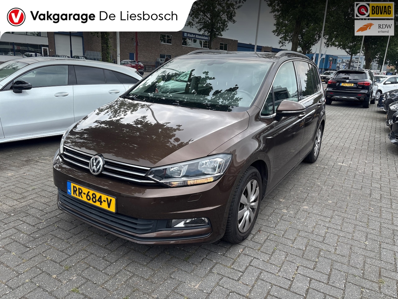Volkswagen Touran - 1.4 TSI Highline 7p/navi/stoelverw/media /clima/boeken/trekhaak - AutoWereld.nl