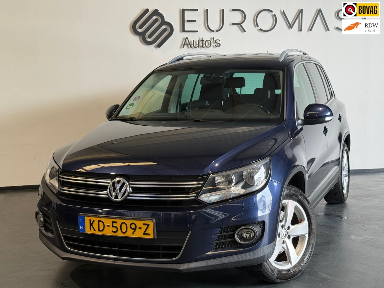 Volkswagen Tiguan - 1.4 TSI Sport&Style Navi Airco Cruise Pdc Nieuwe Apk - AutoWereld.nl