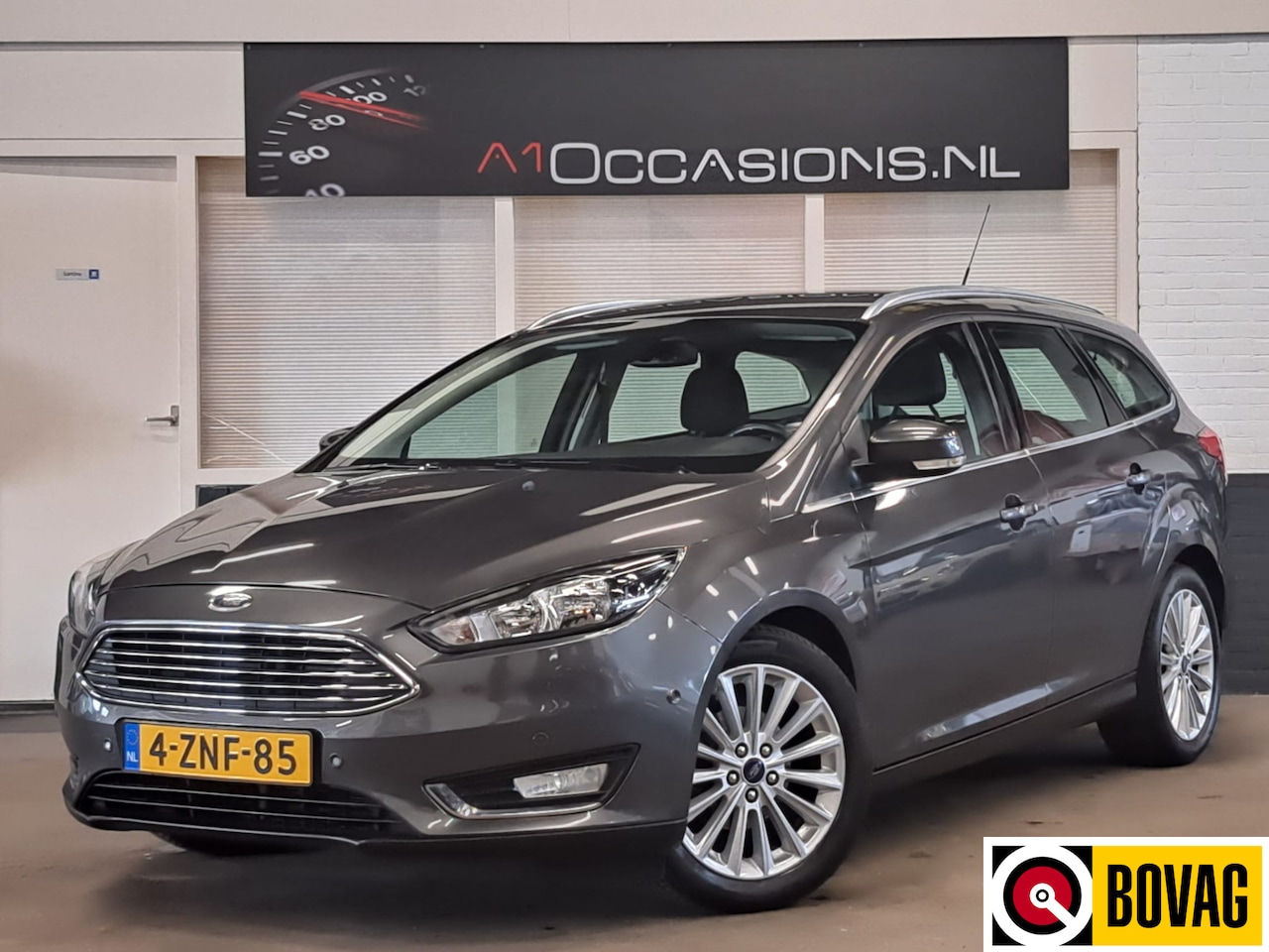 Ford Focus Wagon - 1.0 Titanium + NAVI - AutoWereld.nl
