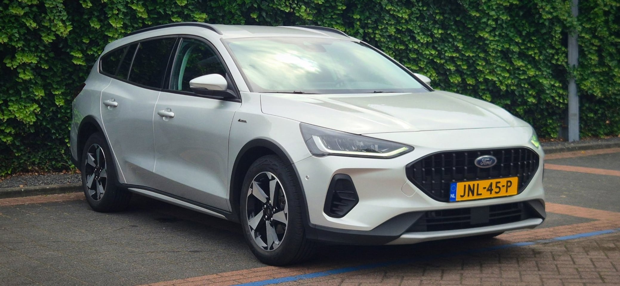 Ford Focus Wagon - 1.0 EcoBoost Hybrid Active X Cam|Cruise|Stoel en stuurverwarming - AutoWereld.nl