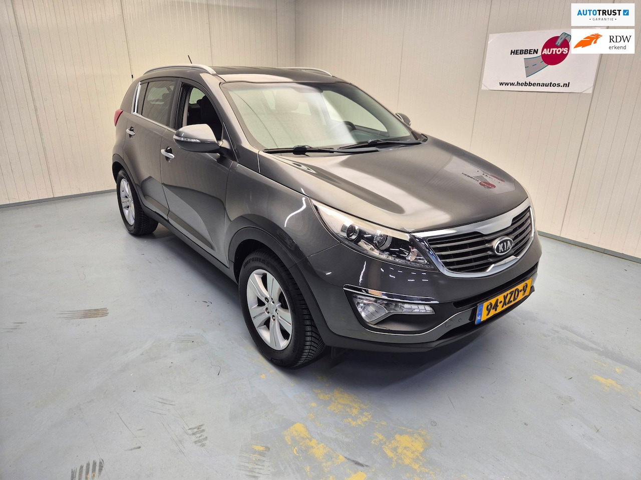 Kia Sportage - 2.0 X-ecutive Plus Pack Navi Ecc Cruise Pdc V & A Alu Velgen Trekhaak - AutoWereld.nl