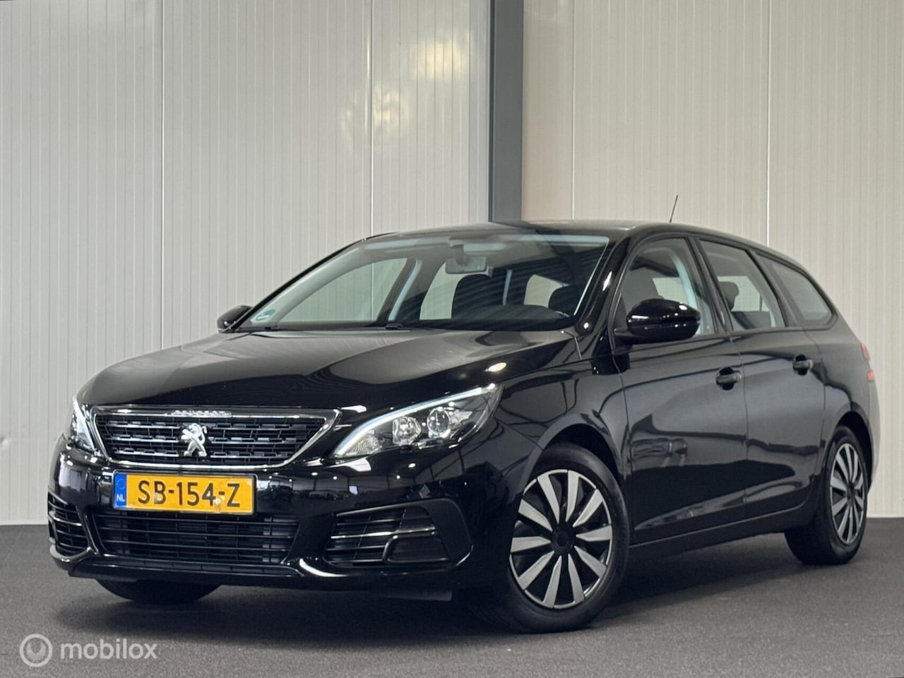 Peugeot 308 SW - 1.6 BlueHDI Blue Lease [ NAP navi EURO6 cruise ] - AutoWereld.nl