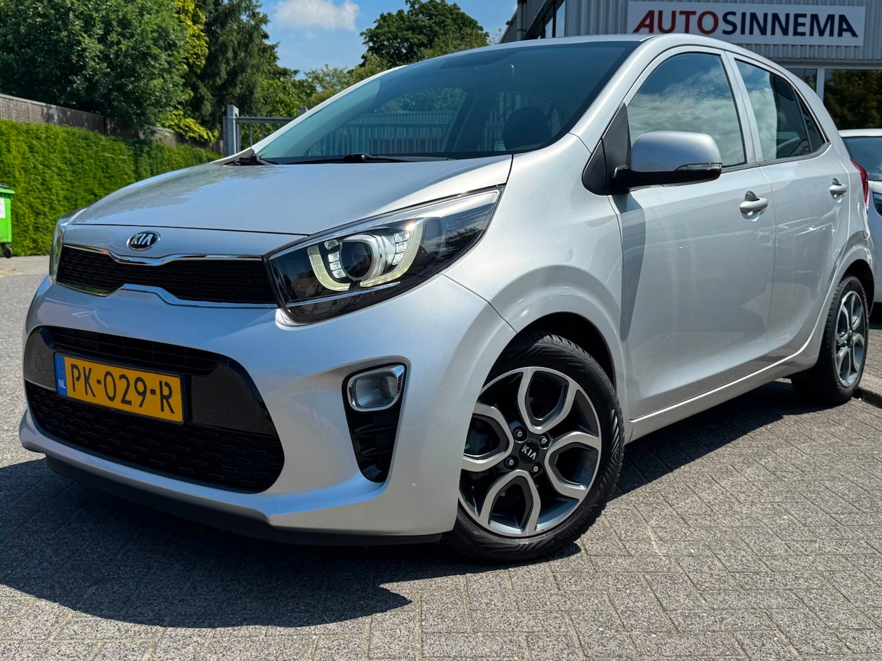 Kia Picanto - 1.2 CVVT First Edition | AUTOMAAT | All Season | Camera | Cruise Control | - AutoWereld.nl