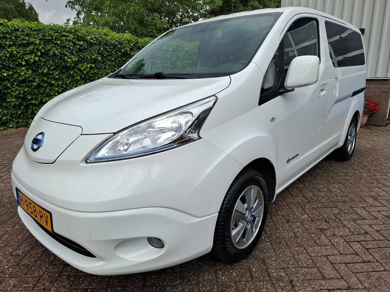 Nissan e-NV200 Evalia - 40 kWh SOH 89.7% 12950.- INCL BTW 7-PERSOONS 110PK - AutoWereld.nl
