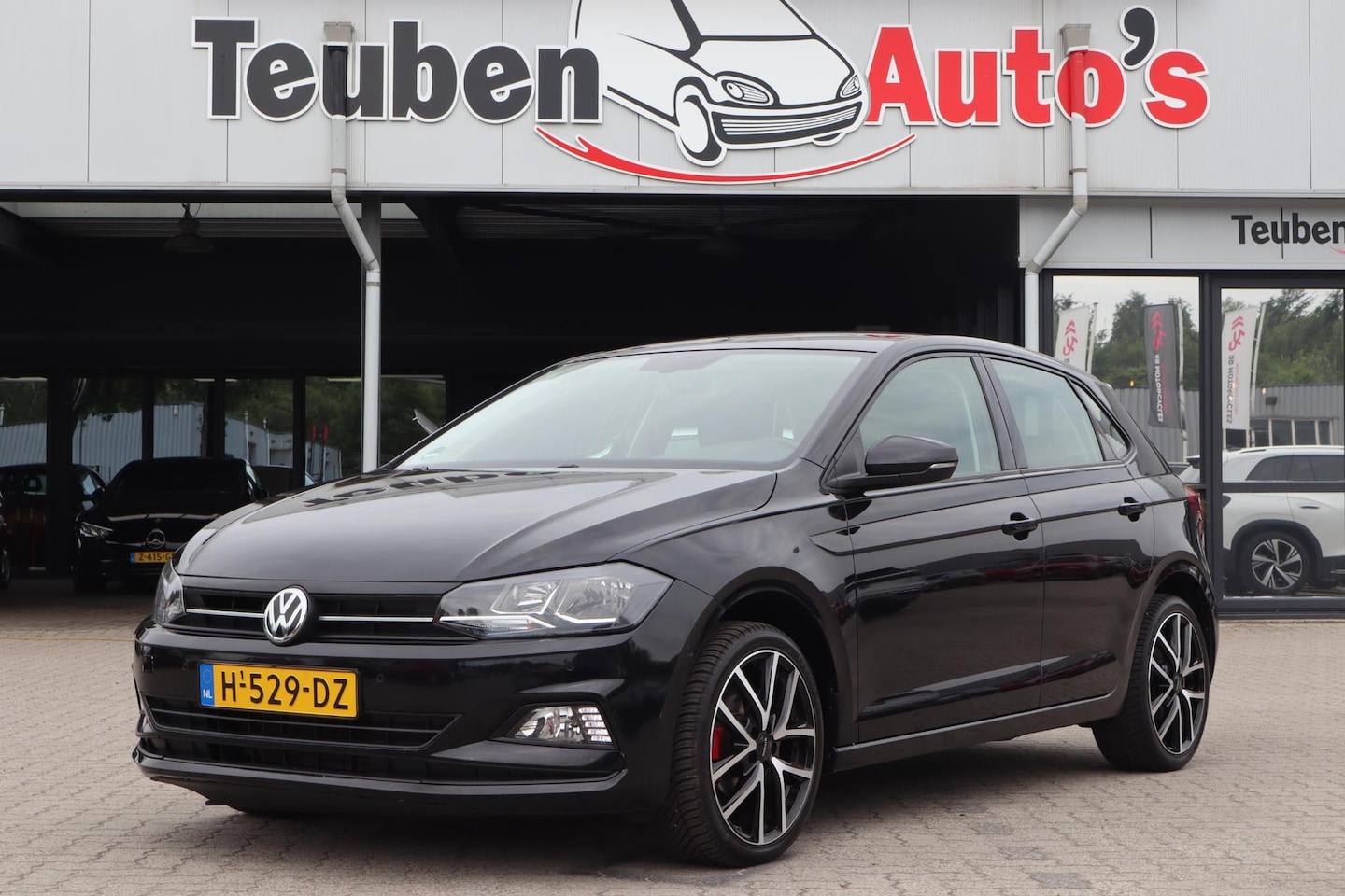 Volkswagen Polo - 1.0 TSI Comfortline | Climate control | Navi | Cruise control | PDC voor en achter - AutoWereld.nl