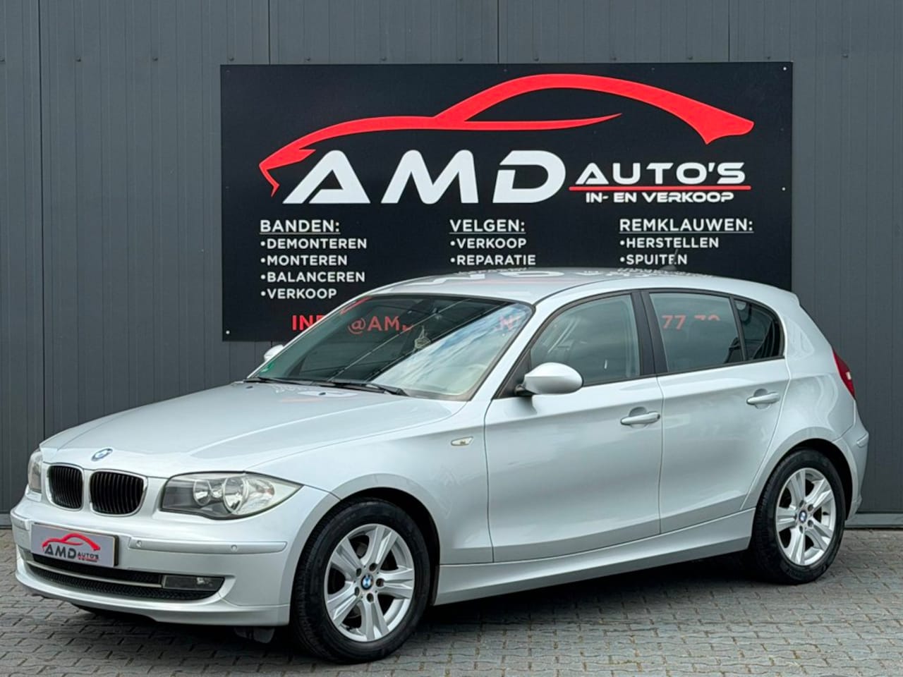 BMW 1-serie - 118i |Nap|Airco|Cruise|Parkeersensor|Stoelverwarming|Boekjes| - AutoWereld.nl