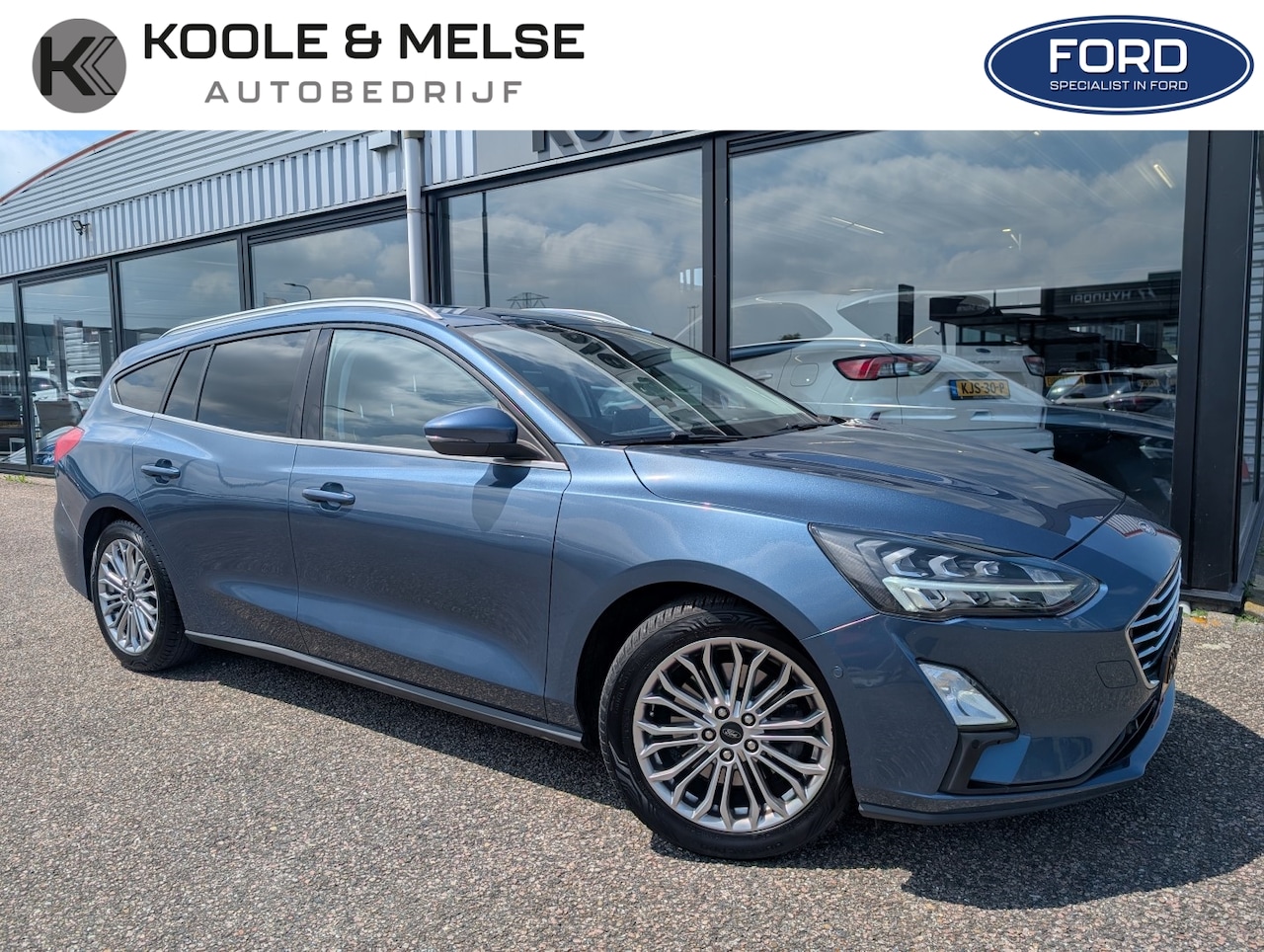 Ford Focus Wagon - 1.0 EcoBoost 125pk Titanium Trekhaak | HUD | Winterpakket - AutoWereld.nl