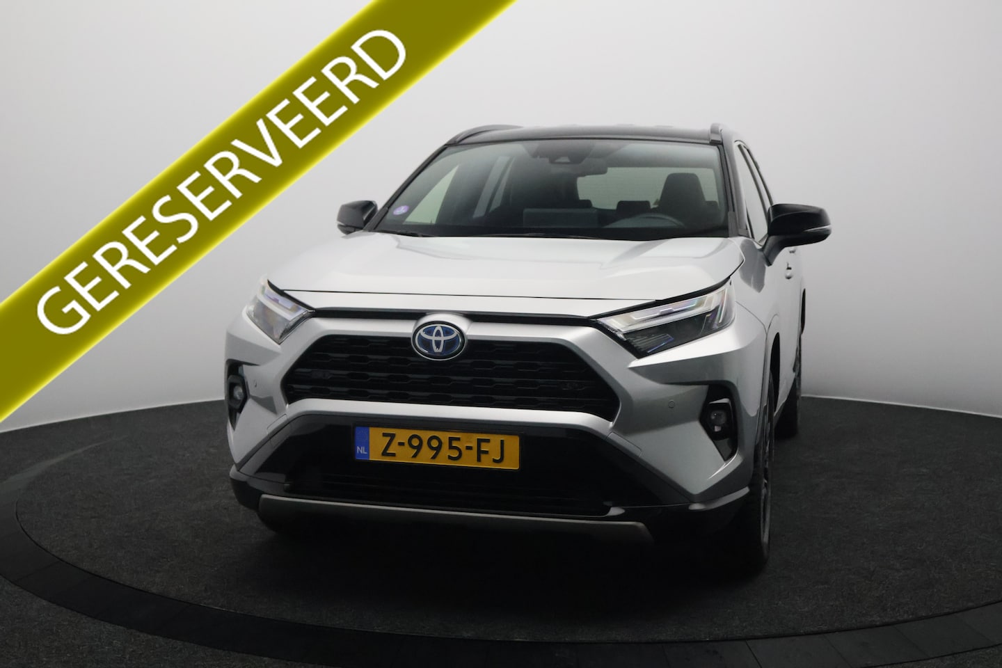 Toyota RAV4 - 2.5 Hybrid AWD Business Plus Bi-Tone | Trekhaak | Carplay&Android | Led | Leer - AutoWereld.nl