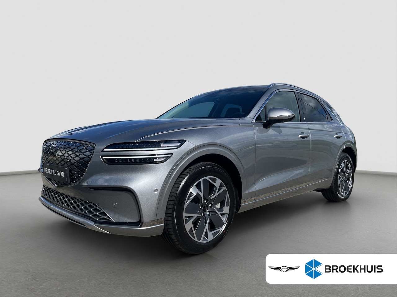 Genesis GV70 - 84 kWh 490pk AWD First Edition | 360 Camera | Winterpakket | 19" Lichtmetaal | Parkeer Ass - AutoWereld.nl