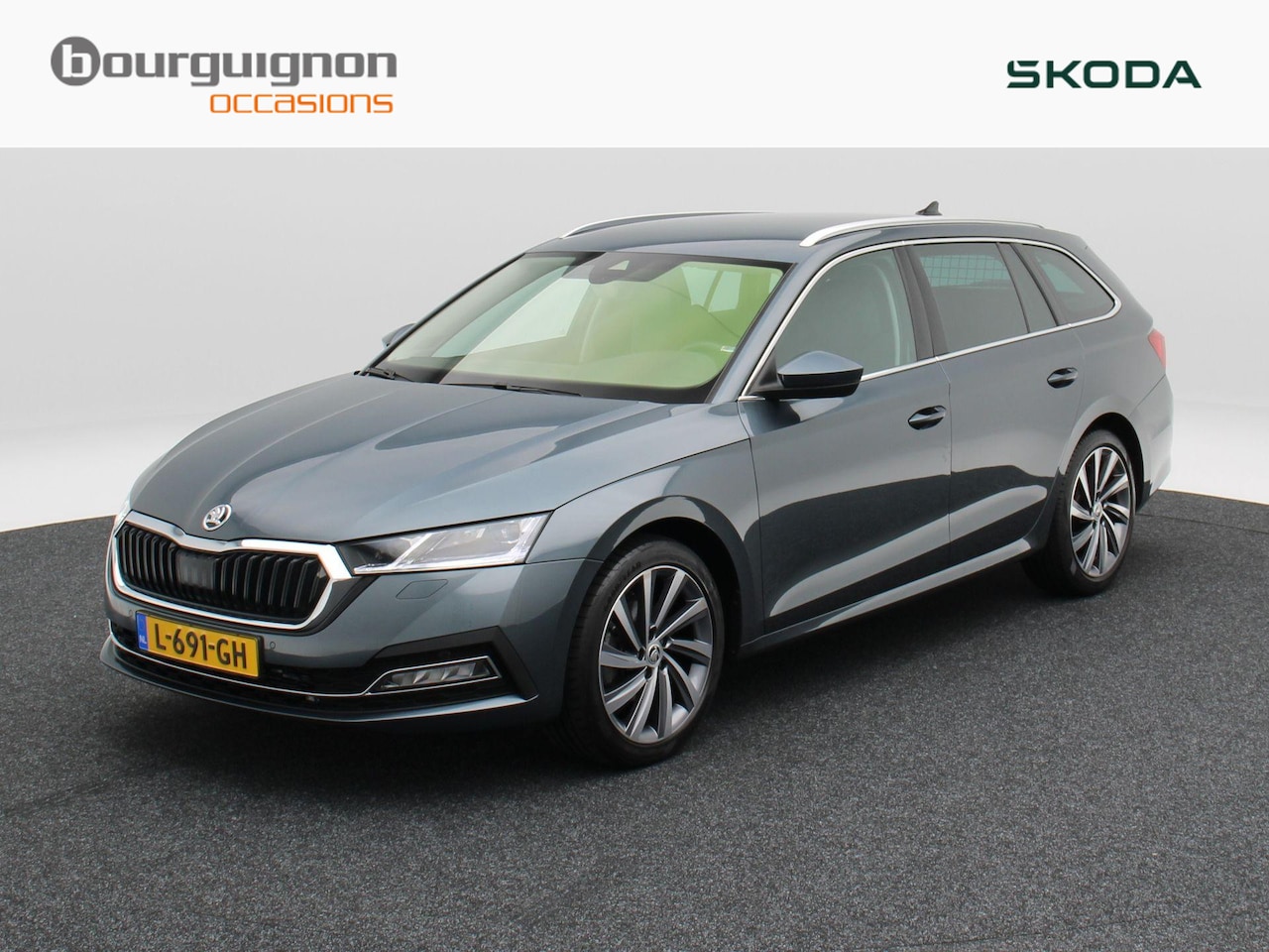 Skoda Octavia Combi - 1.5 e-TSi 150 Pk Automaat Business Edition Plus | Stoelverwarming | Camera | Adaptive Crui - AutoWereld.nl