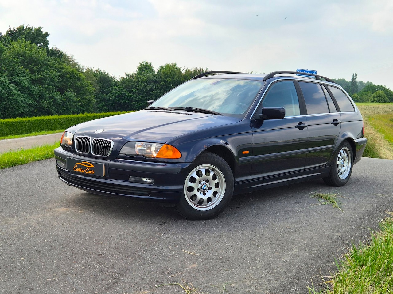 BMW 3-serie Touring - 320i Executive | Nieuwe All Seasons - AutoWereld.nl