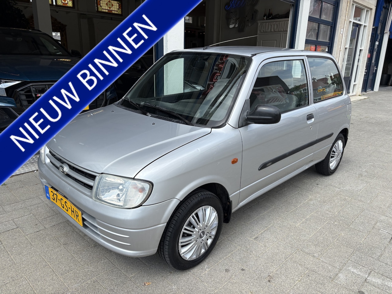 Daihatsu Cuore - 1.0-12V XTi AUTOMAAT/NAP/NW APK 06-2027 - AutoWereld.nl