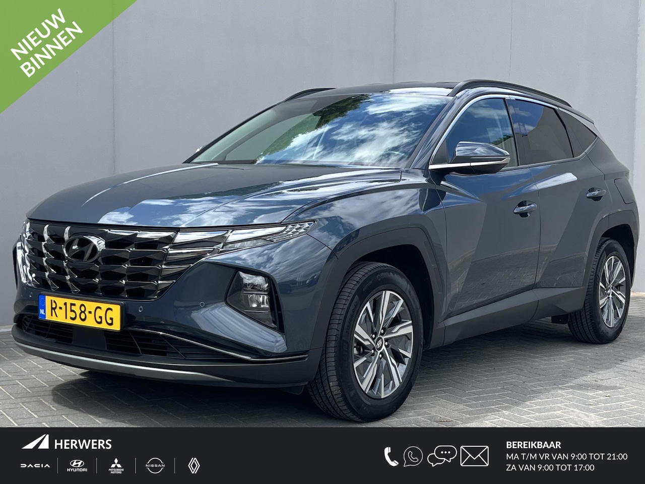 Hyundai Tucson - 1.6 T-GDI HEV Comfort / Trekhaak (1.650KG) / Adaptief Cruise Control / Stoelverwarming / L - AutoWereld.nl