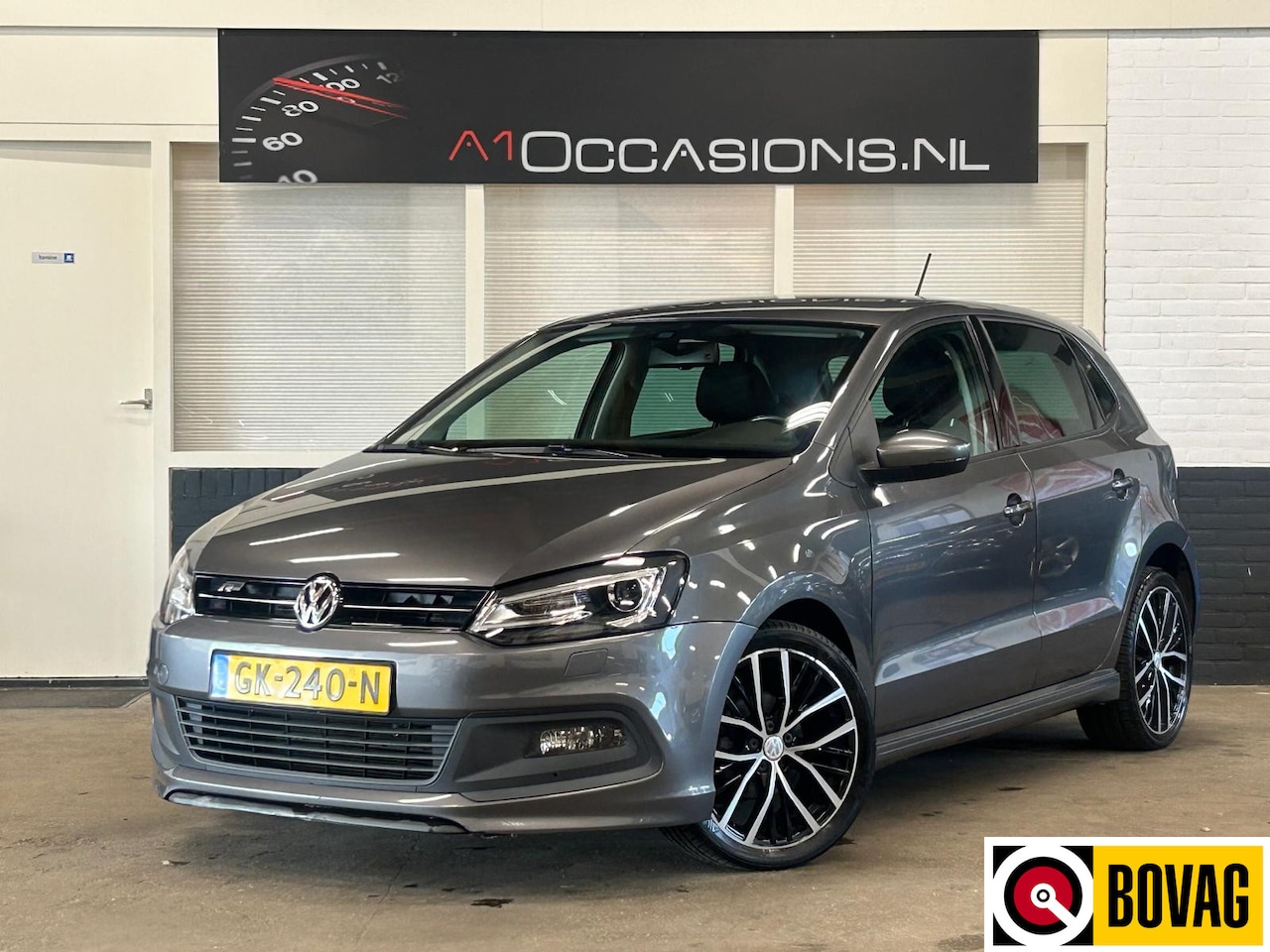 Volkswagen Polo - 1.2 TSI Highline + NAVI - AutoWereld.nl