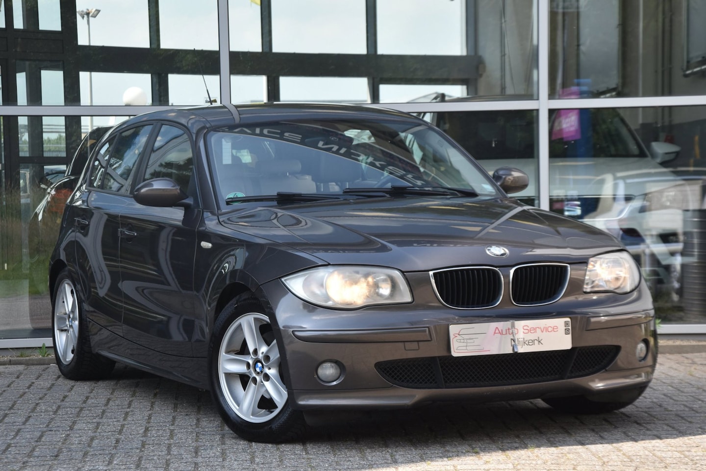 BMW 1-serie - 118d Airco Leder Stoelverwarming Trekhaak Lm-Velgen - AutoWereld.nl