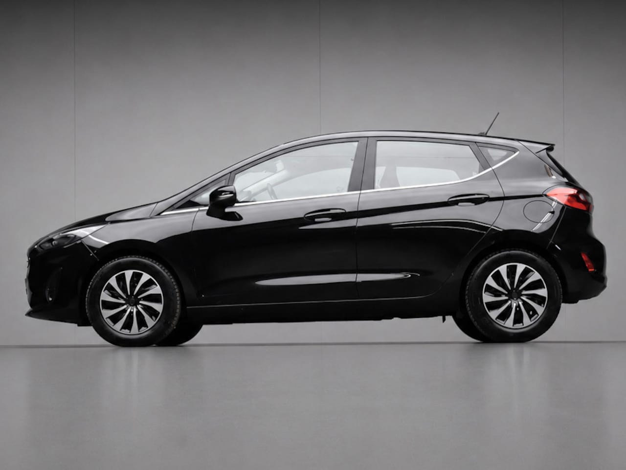 Ford Fiesta - 1.0 EcoBoost Hybrid Titanium (APPLECARPLAY,NAVI SPORTSTOELEN,LED,CRUISE,AIRCO,SPORTPAKKET, - AutoWereld.nl