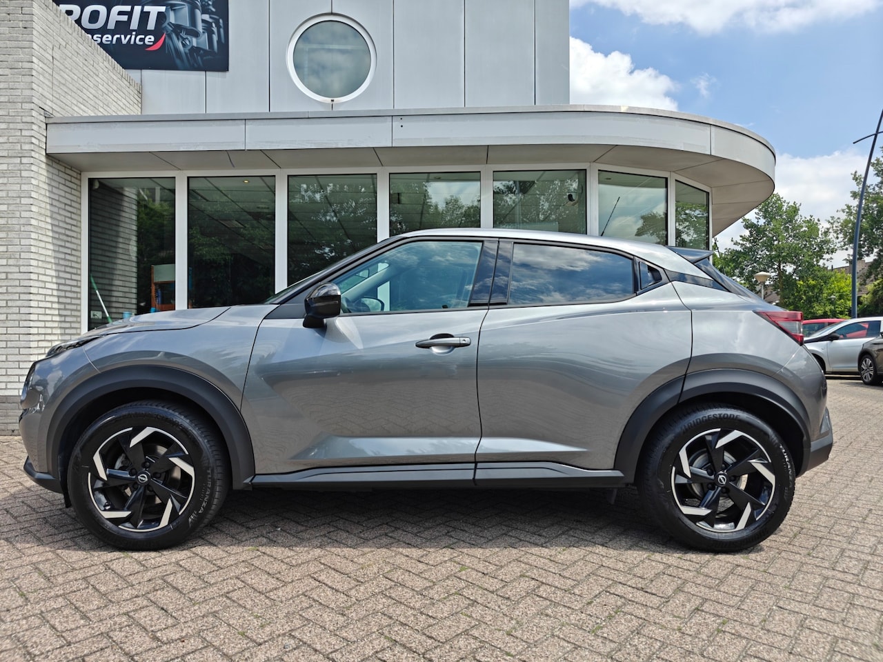 Nissan Juke - 1.0 DIG-T Acenta ECC/ TREKHAAK / STOELVERWARMING / LM VELGEN! - AutoWereld.nl