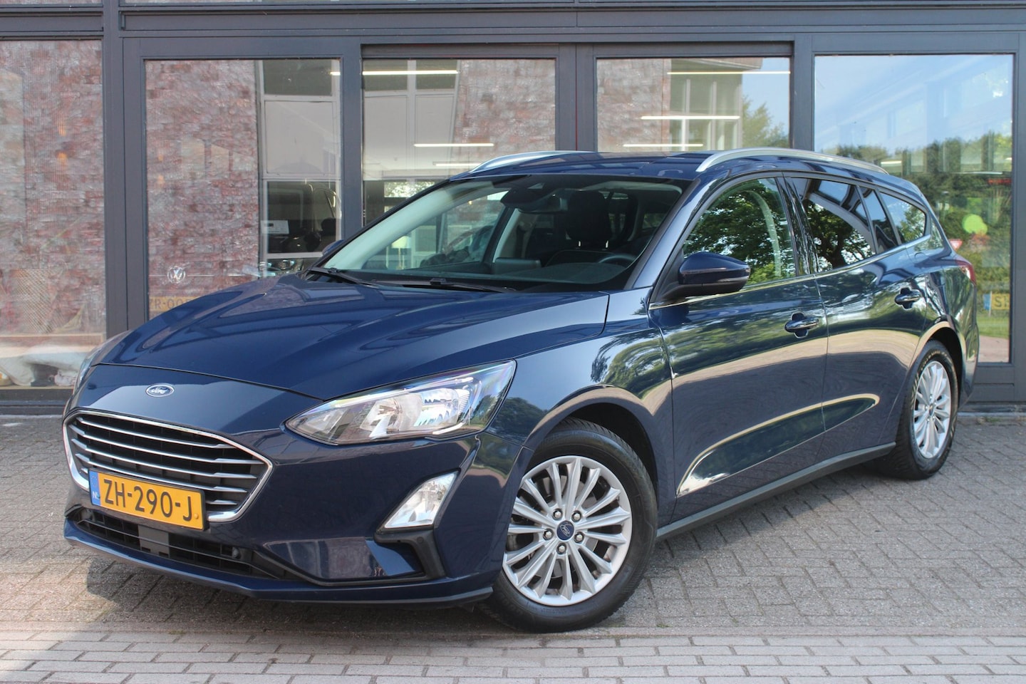 Ford Focus Wagon - 1.0 EcoBoost Titanium Business | Keyless | Cruise-Control | Navigatie | All-Season | Carpl - AutoWereld.nl