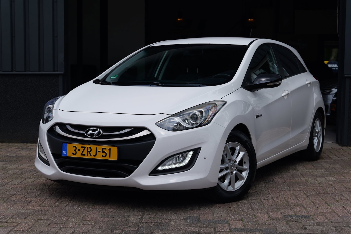 Hyundai i30 - 1.6 GDI Go! Plus Trekhaak|Navigatie|Camera|PDC - AutoWereld.nl