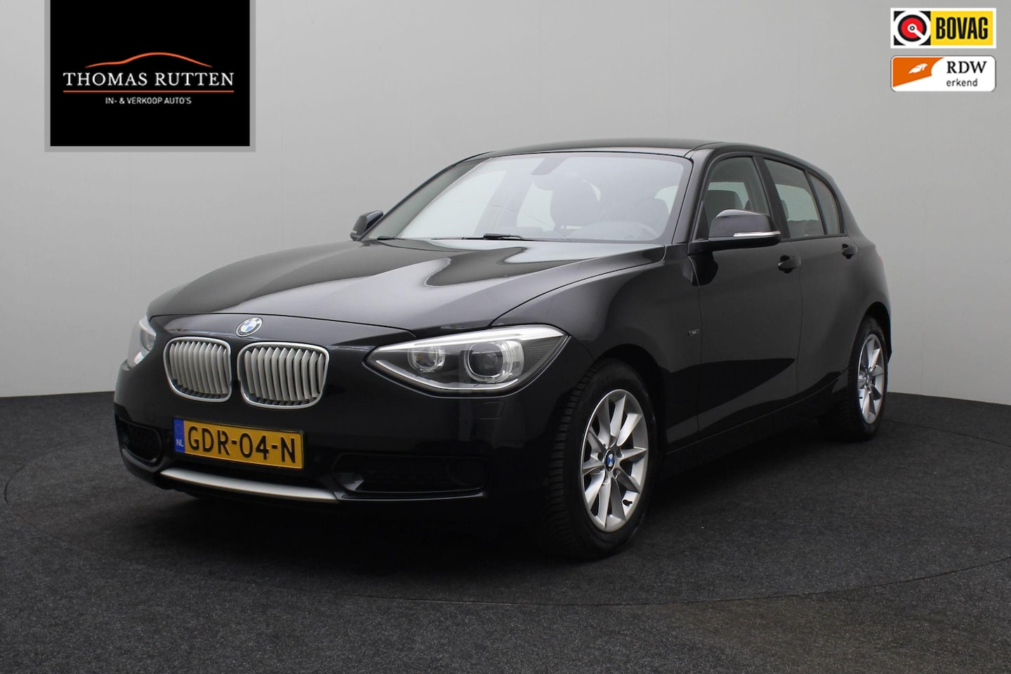 BMW 1-serie - 116i Business+ 2012 | Navigatie | Cruise Control | Stoel Verwarming | Parkeersensoren | Li - AutoWereld.nl