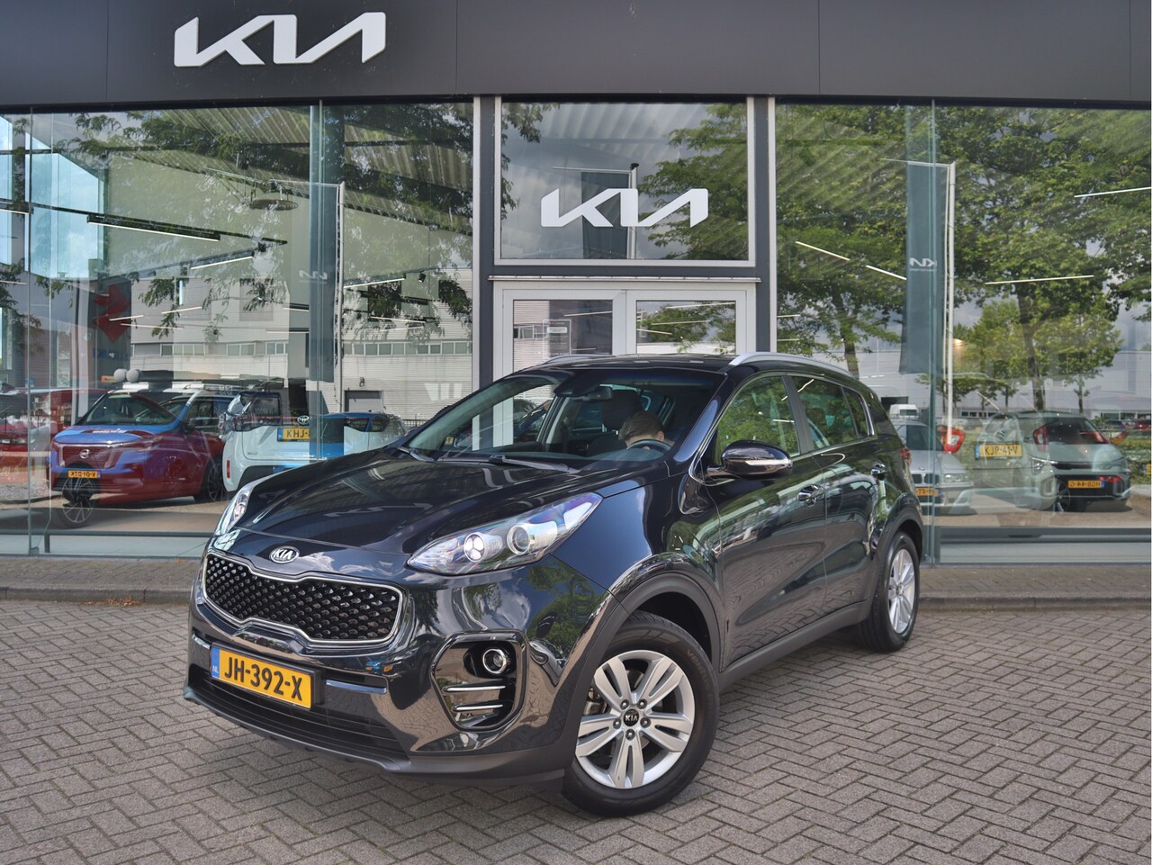 Kia Sportage - 1.6 GDI First Edition | ECC-Airco | Cr.Control | Navi | Camera | BT | USB | Trekhaak | Tot - AutoWereld.nl