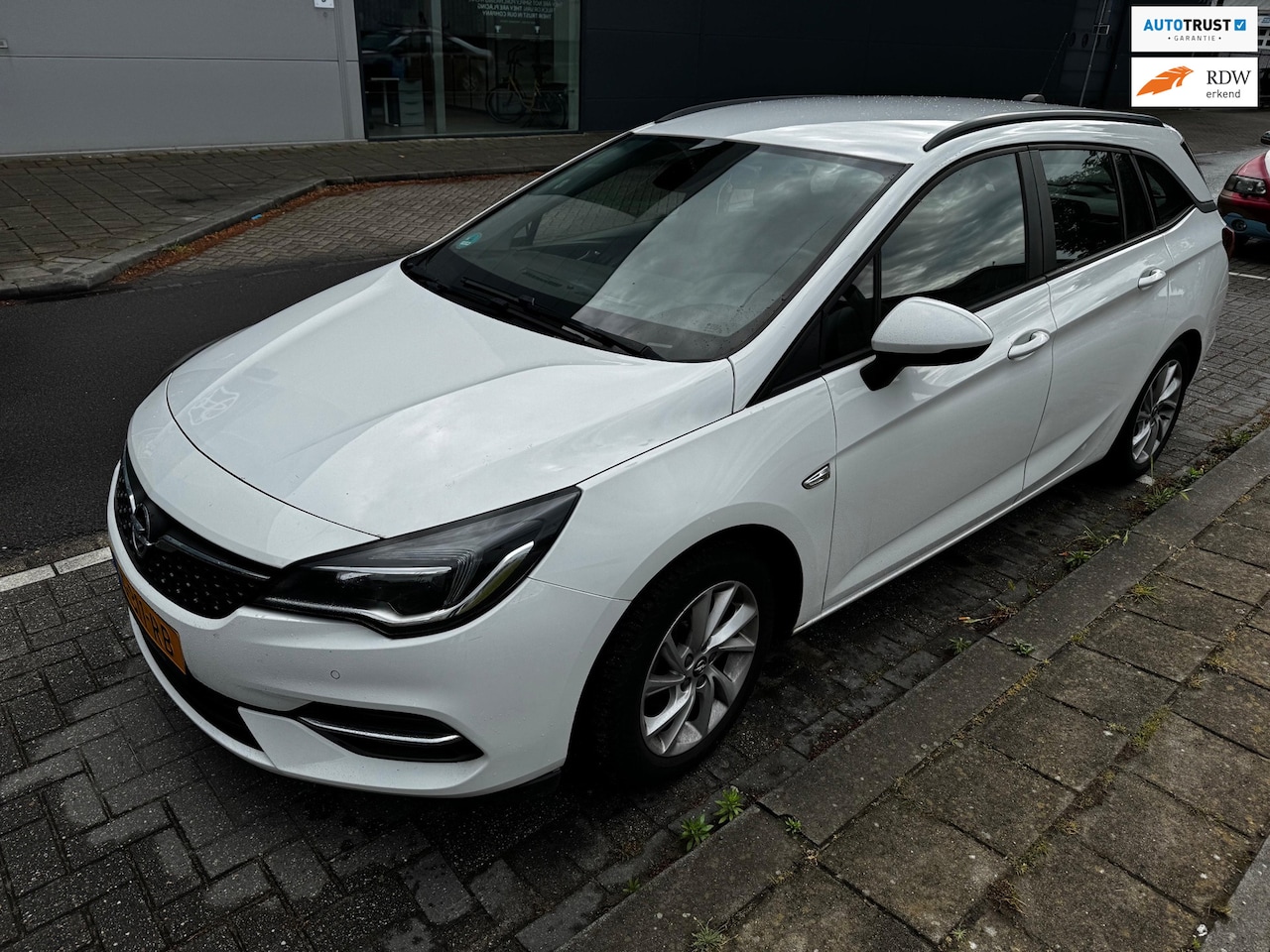 Opel Astra Sports Tourer - 1.2 Edition AIRCO NAVI - AutoWereld.nl