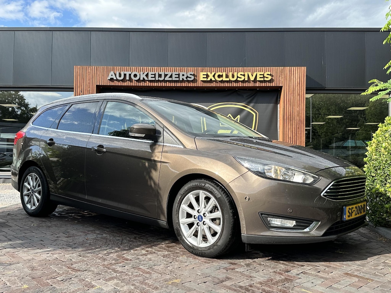 Ford Focus Wagon - 1.0 Titanium Keyless Cruise Control Stoelverw. Navi PDC 16''LM - AutoWereld.nl