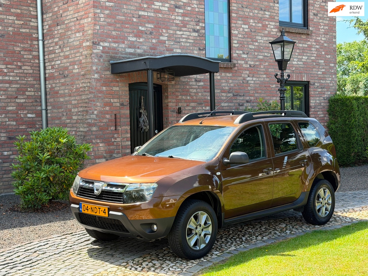 Dacia Duster - 1.6 Lauréate 4x4 AWD Airco 1e eig! - AutoWereld.nl