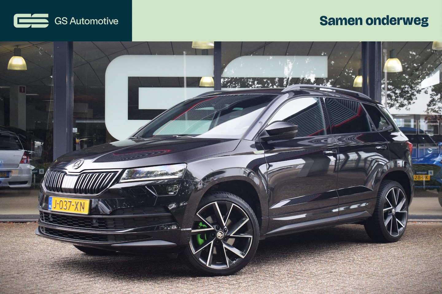 Skoda Karoq - 1.5 TSI ACT Sportline Business met TREKHAAK|NAVIGA - AutoWereld.nl