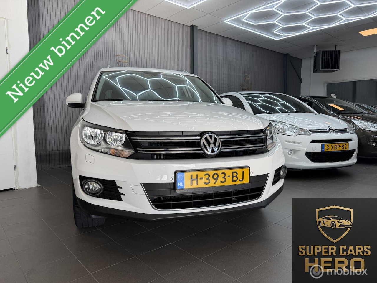Volkswagen Tiguan - 1.4 TSI Sport&Style - AutoWereld.nl