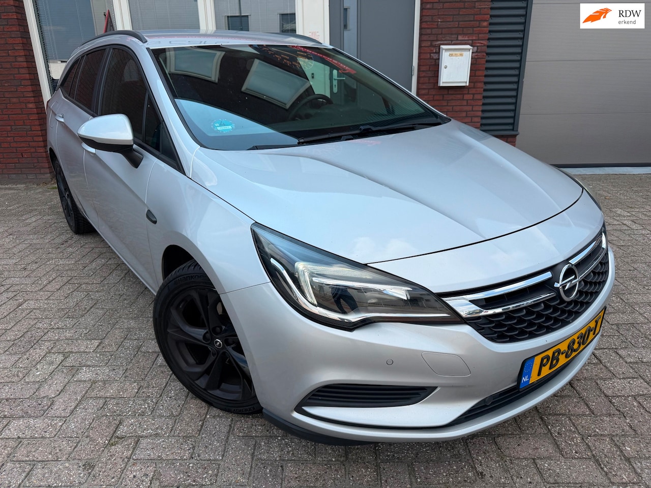 Opel Astra Sports Tourer - 1.0 Online Edition / Navi / Camera / PDC / Airco / NAP / AUT - AutoWereld.nl