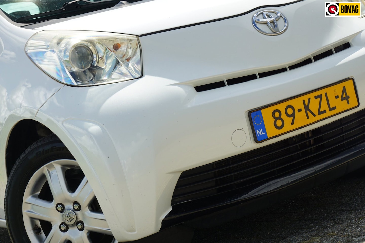 Toyota iQ - 1.0 VVTi Comfort | Pearl White | AC/Navi/Bluetooth/Radio/Cruise - Dealeronderhouden! - AutoWereld.nl