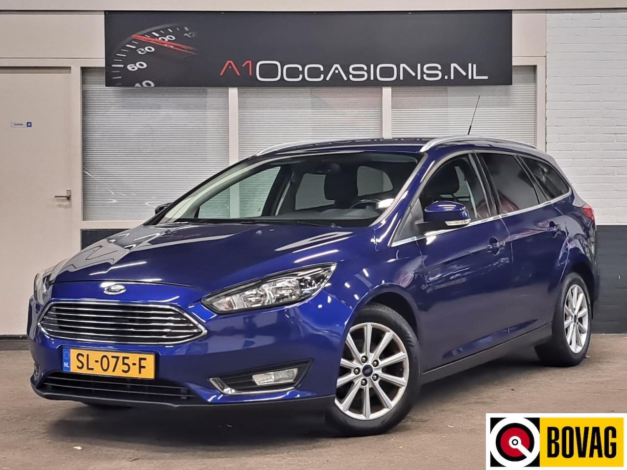 Ford Focus Wagon - 1.0 Titanium + NAVI - AutoWereld.nl